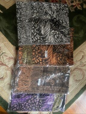 Group of 4 PASHMINA Animal Print Fringe Scarves in Black, Brown, Tan, Purple